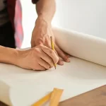 Contractors Insurance in Washington - Image of a person outlining plans on a piece of paper